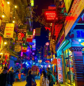 The vibrant Thamel area in Kathmandu, Nepal, bustling with shops, cafes, and tourists, showcasing colorful streets, local crafts, and the lively atmosphere of this popular neighborhood.