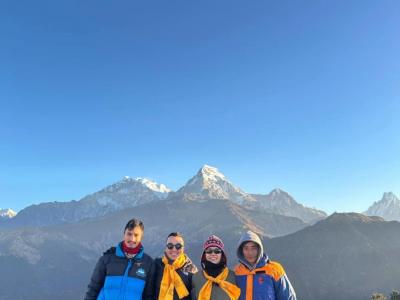 Standing tall with the Himalayas as our backdrop! Ghorepani Poonhill vibes.